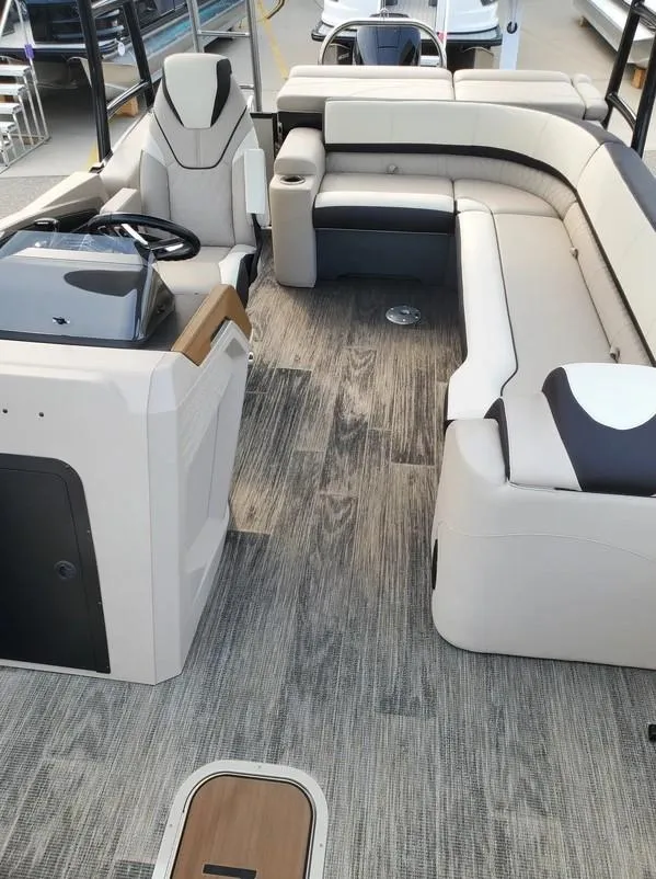 Slide: The Image of 2024 Avalon Catalina Entertainer Funship interior with plush seating and modern helm. - 19