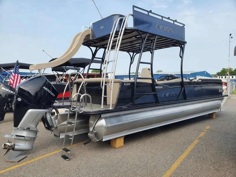 Slide: The Image of 2024 Avalon Catalina Entertainer Funship pontoon boat with slide and Mercury outboard motor. - 6