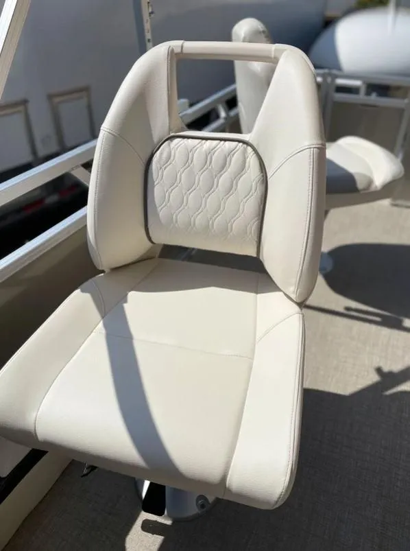 Slide: The Image of 2024 Avalon Cruise or Fish boat seat with white upholstery and textured backrest. - 13