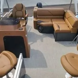 Slide: The Image of 2024 Avalon Cruise or Fish boat interior with brown seating and helm station. - 3