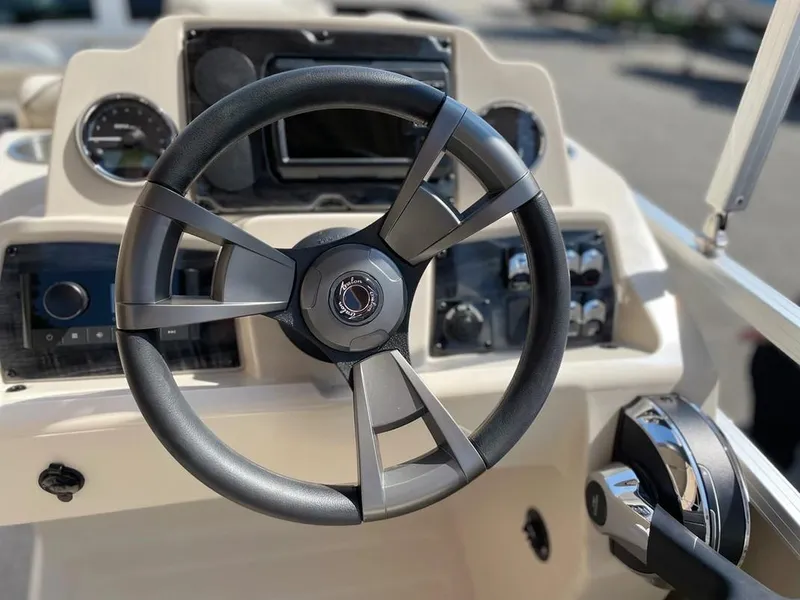 Slide: The Image of Steering wheel and dashboard of 2024 Avalon Cruise or Fish boat. - 6