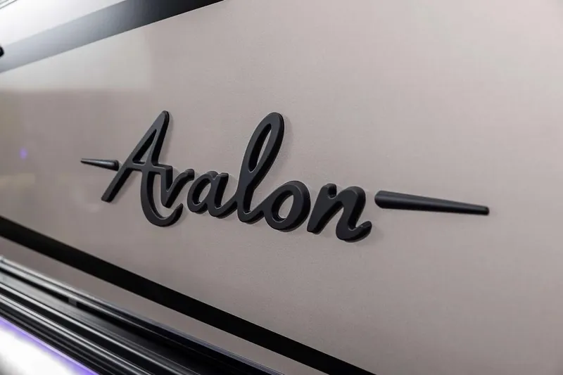 Slide: The Image of 2024 Avalon Excalibur LTD Elite Windshield logo on sleek surface. - 12