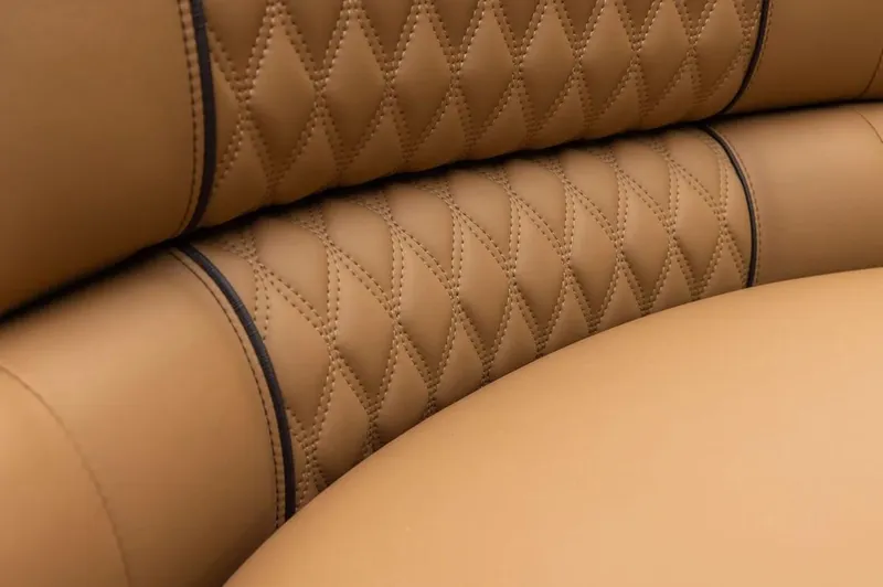 Slide: The Image of Luxurious tan leather upholstery with diamond stitching in 2024 Avalon Excalibur LTD Elite Windshield. - 17