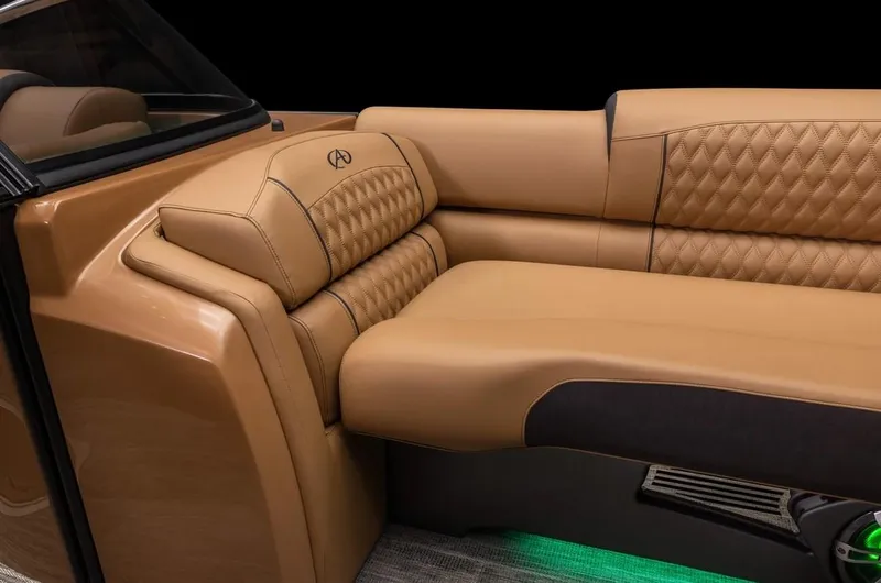 Slide: The Image of Luxurious tan leather seating in 2024 Avalon Excalibur LTD Elite Windshield boat interior. - 18