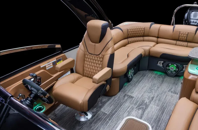 Slide: The Image of Luxurious 2024 Avalon Excalibur LTD Elite boat interior with plush seating and modern design. - 19