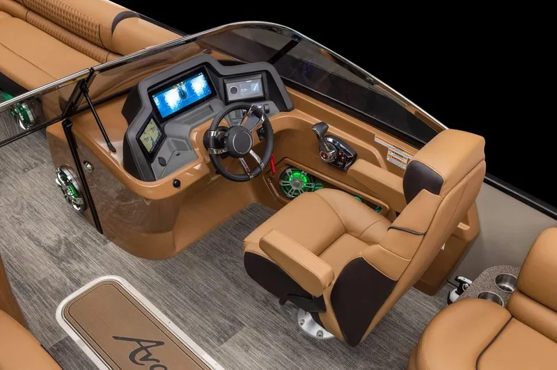 Slide: The Image of 2024 Avalon Excalibur LTD Elite Windshield boat interior with modern dashboard and luxurious seating. - 20