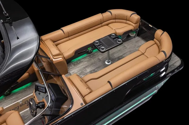 Slide: The Image of 2024 Avalon Excalibur LTD Elite Windshield boat interior with luxurious tan seating and modern design. - 34