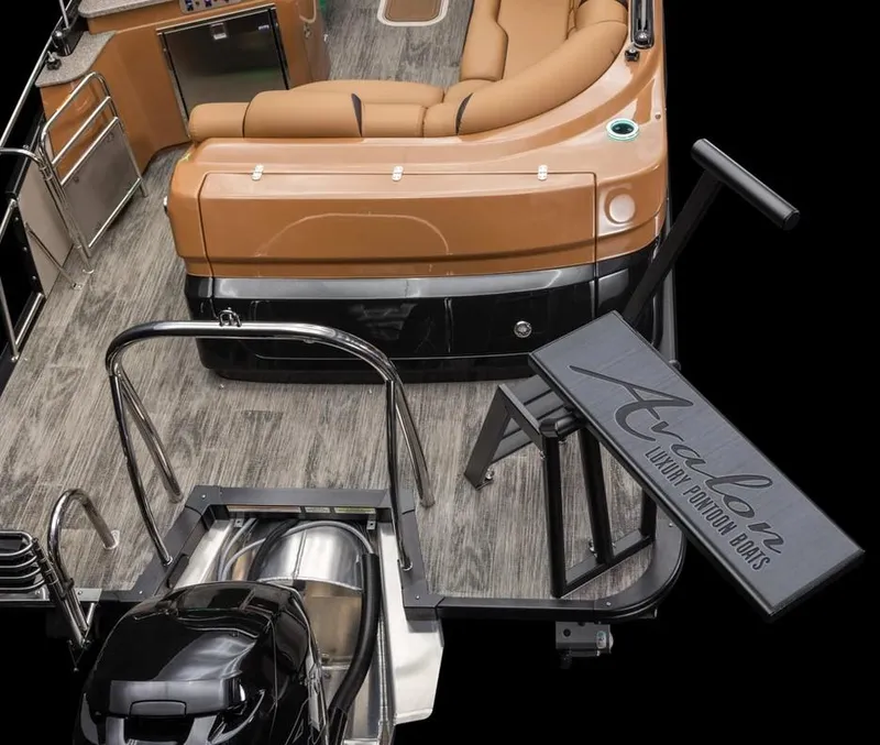 Slide: The Image of 2024 Avalon Excalibur LTD Elite Windshield luxury pontoon boat interior with seating and motor. - 35