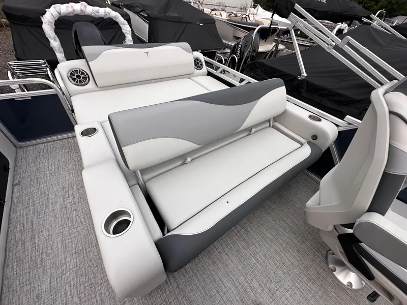 Slide: The Image of 2025 Tahoe Pontoon LTZ Versatile Rear Lounger with sleek seating and cup holders. - 7
