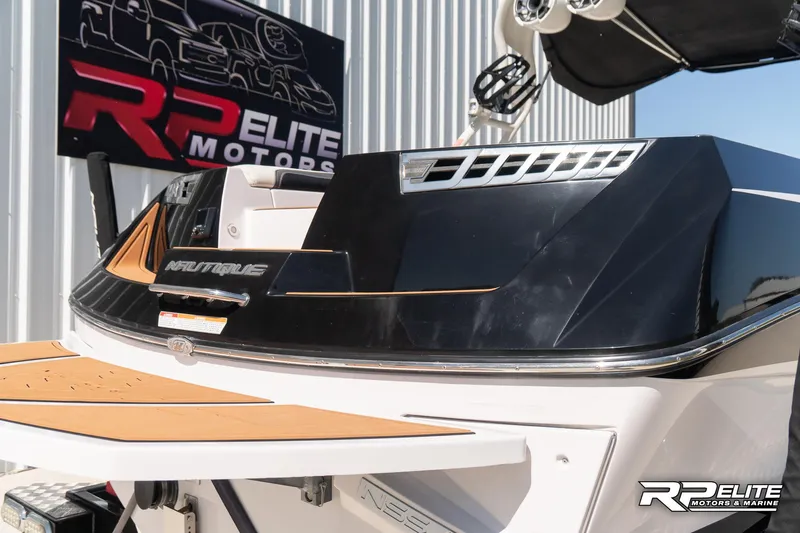 Slide: The Image of 2014 Nautique Super Air Nautique 230 boat at RP Elite Motors showroom. - 29