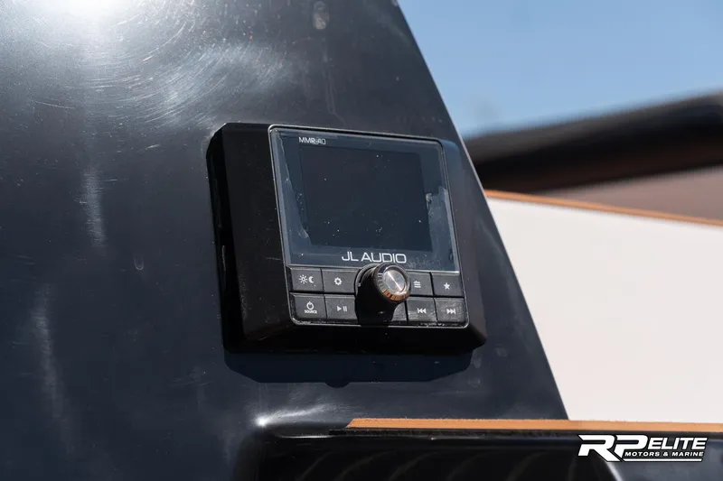 Slide: The Image of JL Audio system on 2014 Nautique Super Air Nautique 230 dashboard. - 30