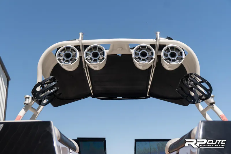 Slide: The Image of 2014 Nautique Super Air Nautique 230 wakeboard tower with speakers, viewed from below. - 31