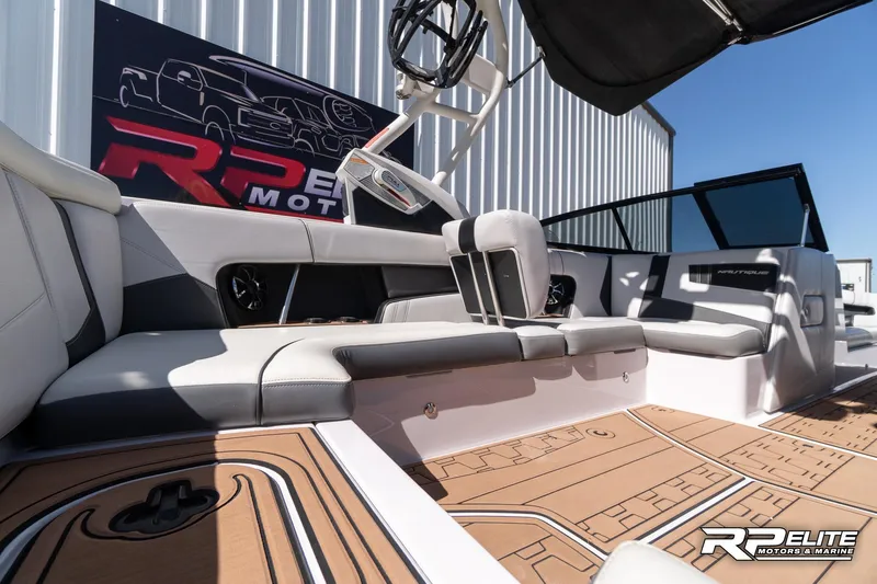 Slide: The Image of 2014 Nautique Super Air Nautique 230 interior with sleek seating and modern design. - 42