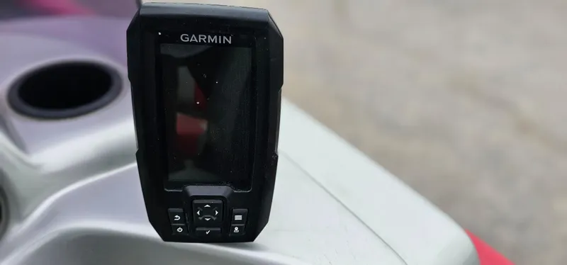 Slide: The Image of Garmin device on 2014 Tracker PG V16 SC boat dashboard. - 9