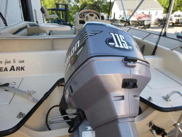Slide: The Image of SeaArk Sunstar 21 boat with Johnson 115 outboard motor, 2000 model. - 3