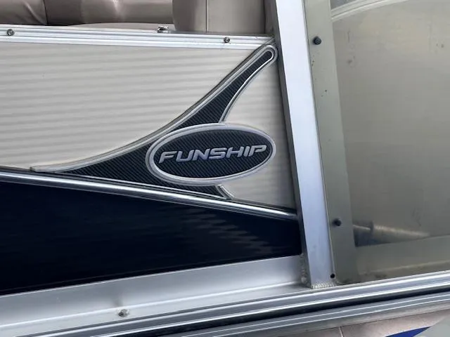 Slide: The Image of 2016 Tahoe Pontoon Vista Funship Entertainer, close-up of "Funship" emblem. - 13