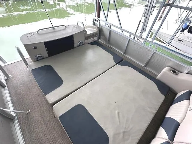 Slide: The Image of 2016 Tahoe Pontoon Vista Funship Entertainer with spacious seating and deck area. - 26