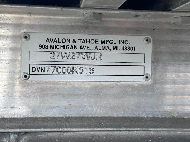 Slide: The Image of Metal identification plate for 2016 Tahoe Pontoon Vista Funship Entertainer, showing serial and DVN numbers. - 29