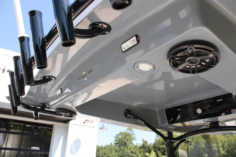 Slide: The Image of 2023 Fountain 34 CC boat's overhead view with speakers and rod holders. - 22
