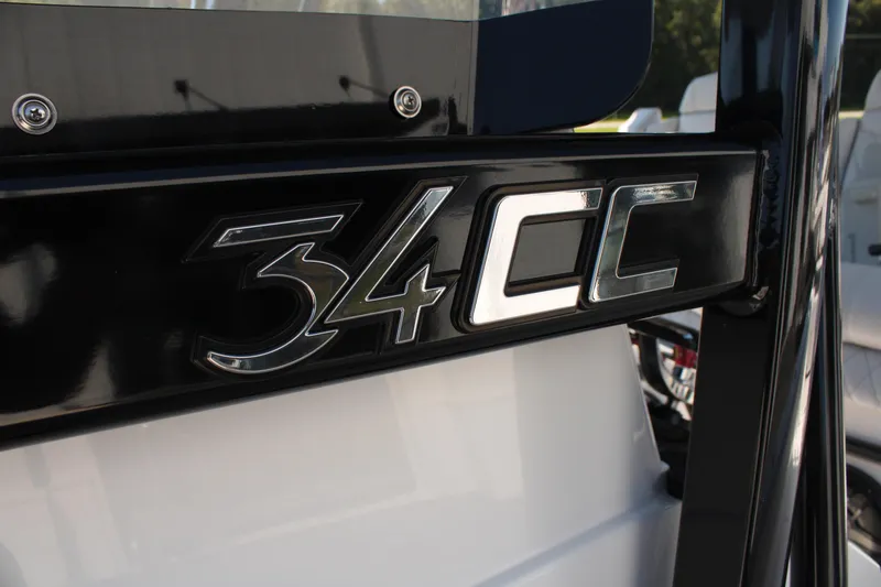 Slide: The Image of Close-up of 2023 Fountain 34 CC boat model emblem. - 24
