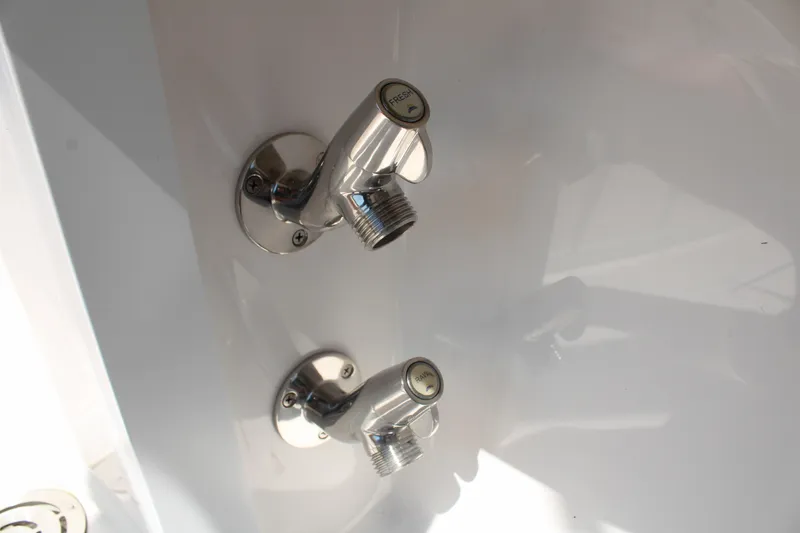 Slide: The Image of Chrome boat fittings on a 2023 Fountain 34 CC. - 39