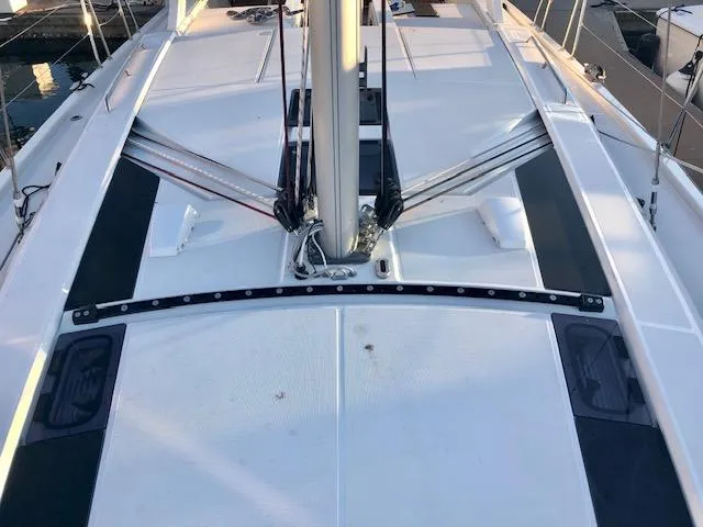 Slide: The Image of Deck view of 2023 Beneteau Oceanis 46.1 sailboat, showcasing mast and rigging. - 18