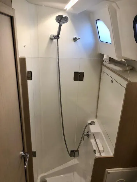 Slide: The Image of Bathroom interior of 2023 Beneteau Oceanis 46.1 yacht, featuring modern shower design. - 33