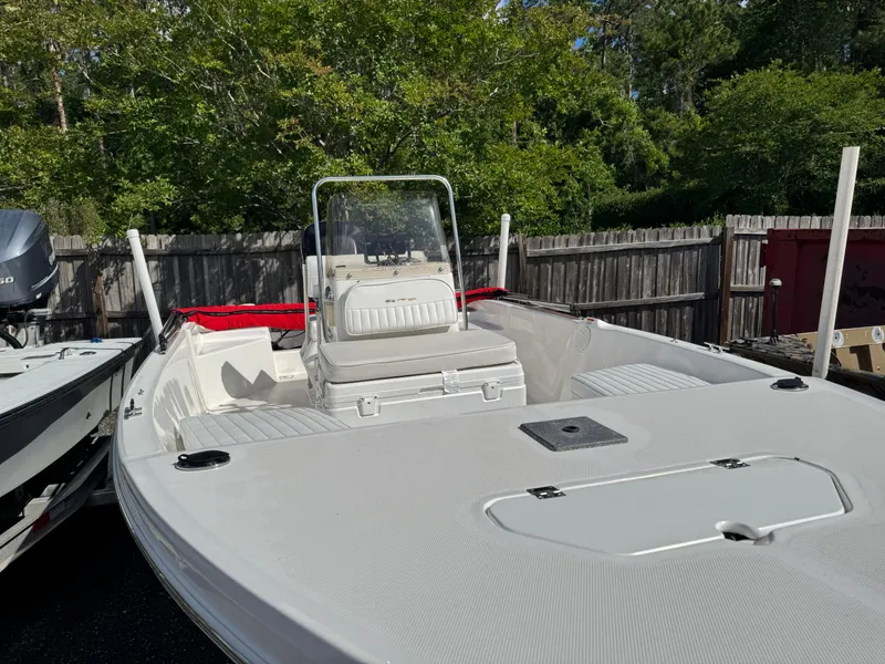 Slide: The Image of 2006 Sea Fox 185 Bay Fisher boat with center console, parked outdoors. - 10