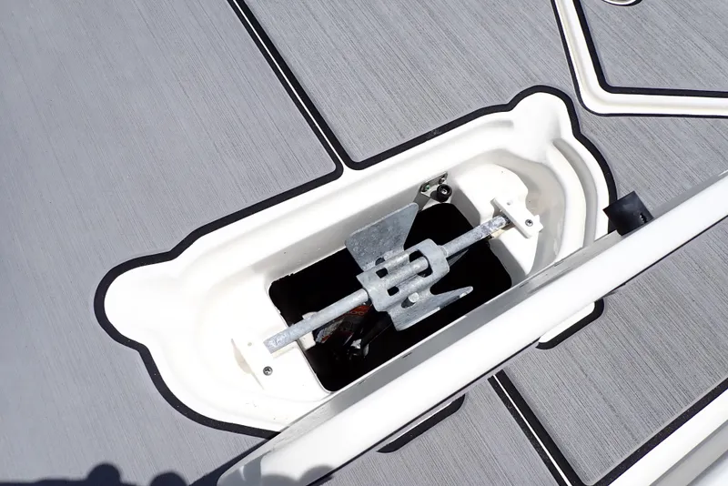 Slide: The Image of Anchor compartment of 2021 NauticStar 223 DC boat with open hatch. - 30