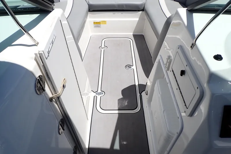 Slide: The Image of 2021 NauticStar 223 DC boat interior with sleek seating and modern design. - 40