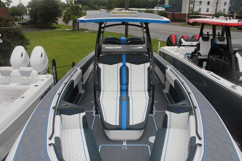 Slide: The Image of 2024 Fountain 34 SC boat with sleek design and modern seating arrangement. - 10