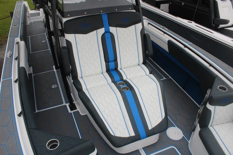 Slide: The Image of 2024 Fountain 34 SC boat interior with stylish seating and modern design. - 12