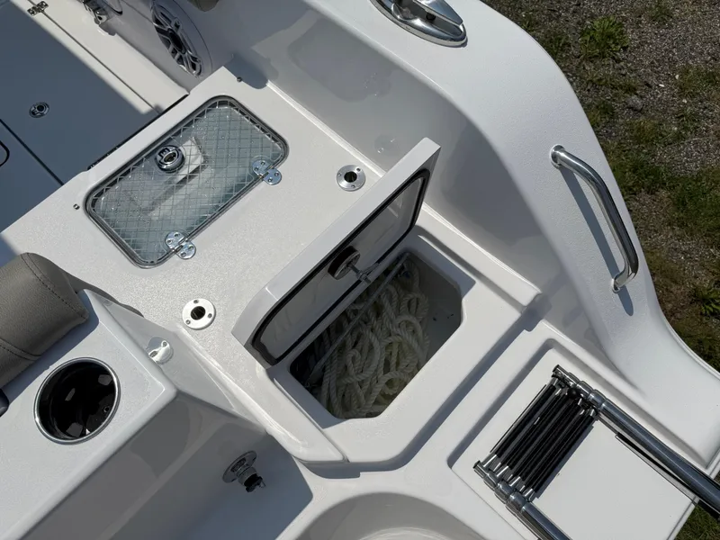 Slide: The Image of 2025 Sportsman Heritage 261 Center Console boat storage compartments and accessories. - 10