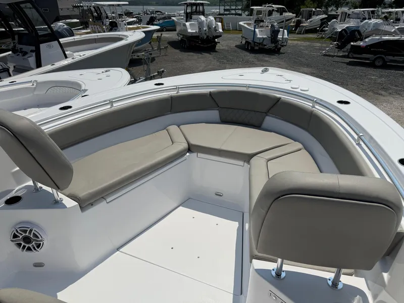 Slide: The Image of 2025 Sportsman Heritage 261 Center Console boat with spacious seating and modern design. - 25