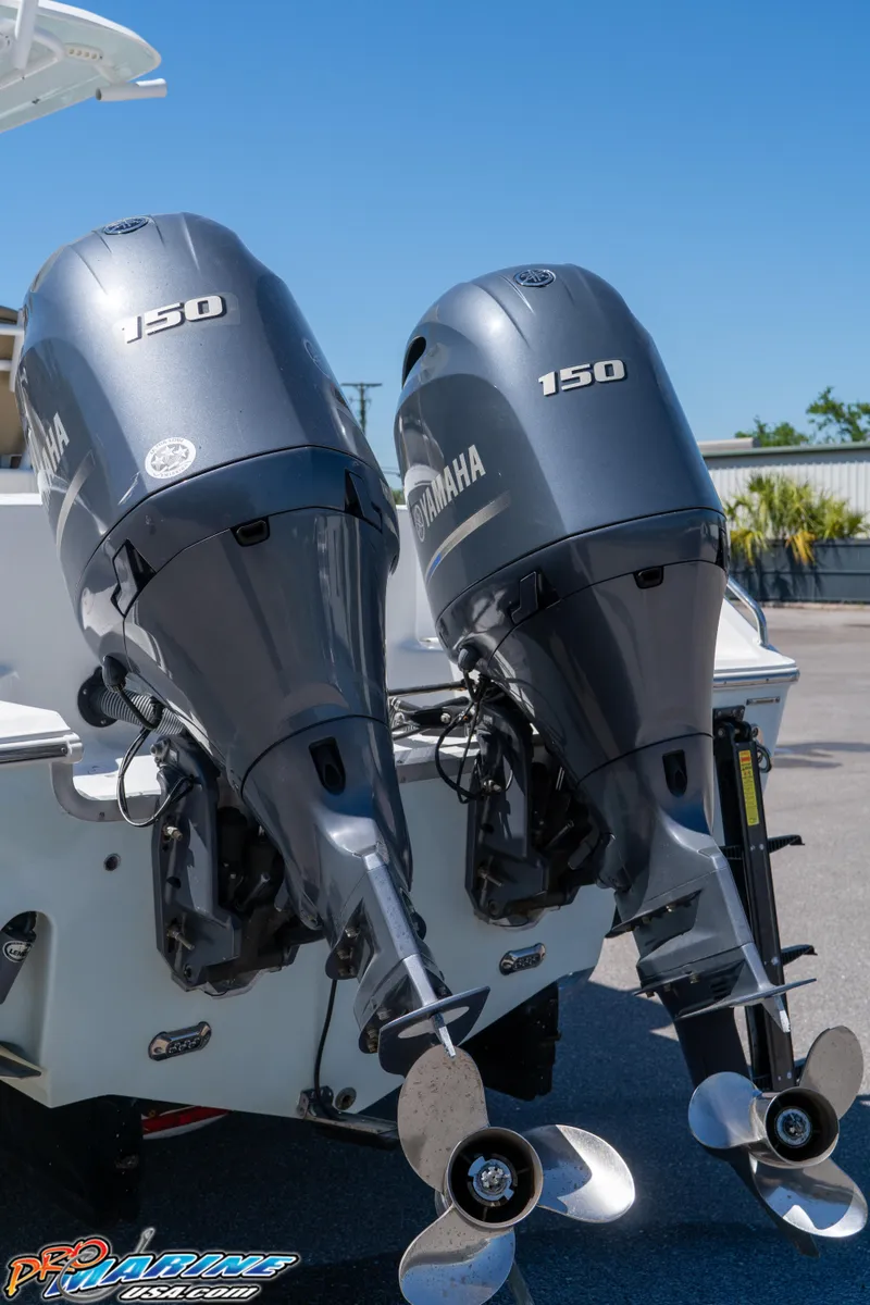 Slide: The Image of Twin Yamaha 150 outboard motors on a 2017 Sea Hunt Gamefish 25 boat. - 11