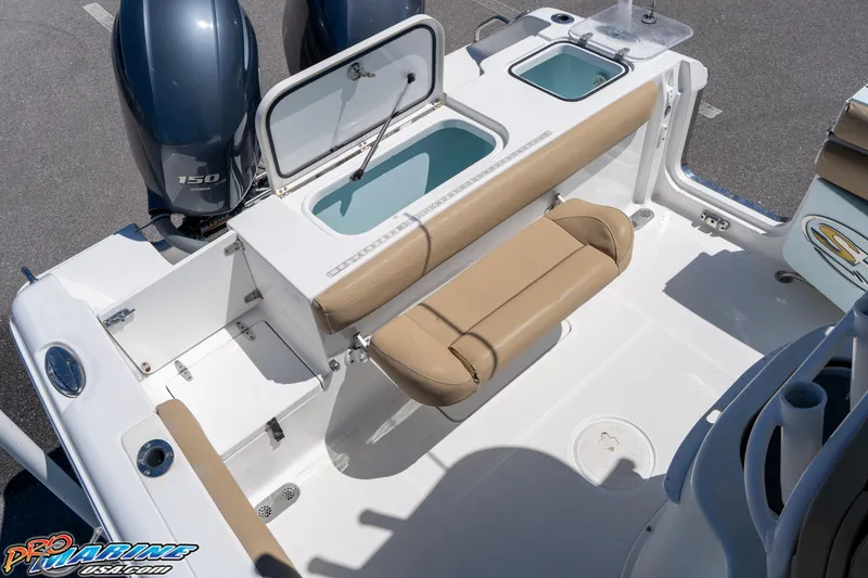 Slide: The Image of 2017 Sea Hunt Gamefish 25 boat interior with seating and storage compartments. - 18