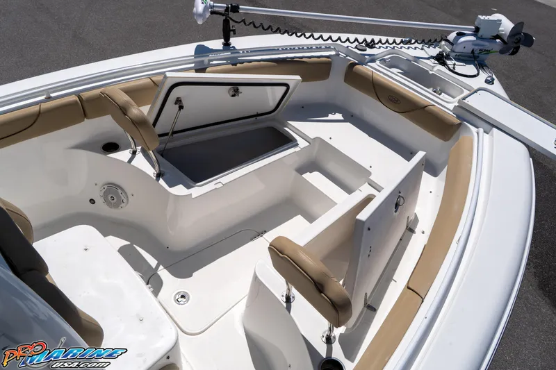 Slide: The Image of 2017 Sea Hunt Gamefish 25 boat interior with open storage compartments and seating. - 28