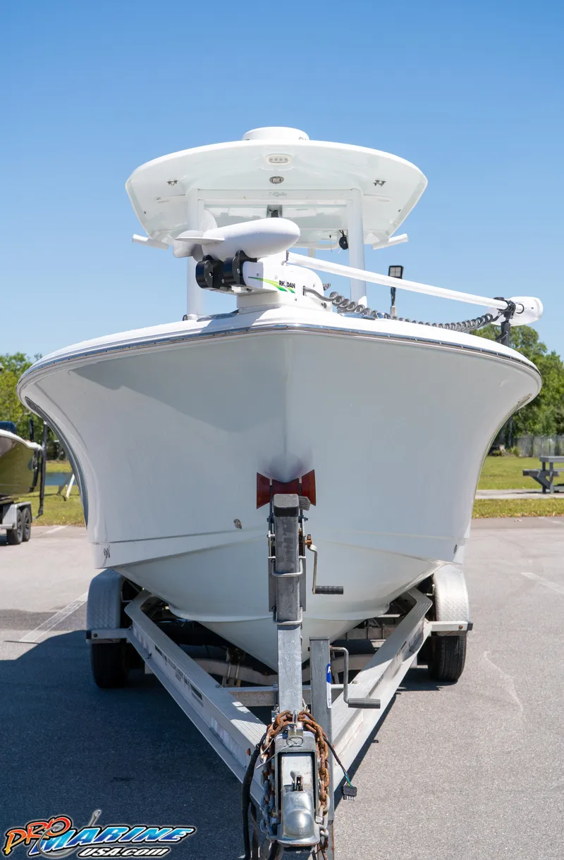 Slide: The Image of 2017 Sea Hunt Gamefish 25 boat on trailer, front view, outdoors. - 3