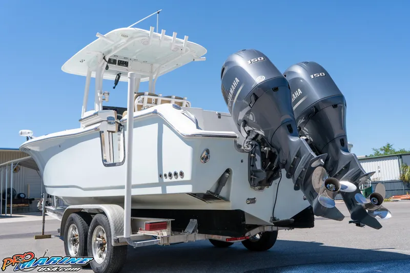 Slide: The Image of 2017 Sea Hunt Gamefish 25 boat on trailer with dual Yamaha engines. - 7