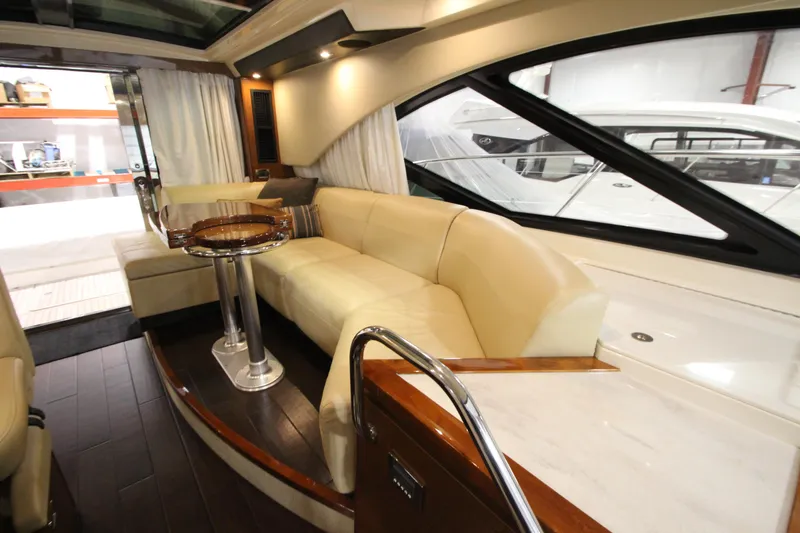 Slide: The Image of Luxurious interior of 2016 Sea Ray 510 Sundancer yacht with cream leather seating. - 47