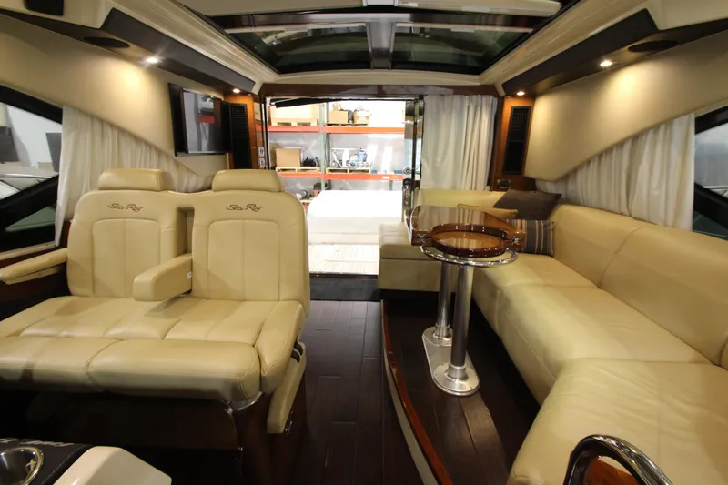 Slide: The Image of Luxurious interior of 2016 Sea Ray 510 Sundancer yacht with leather seating and elegant design. - 48