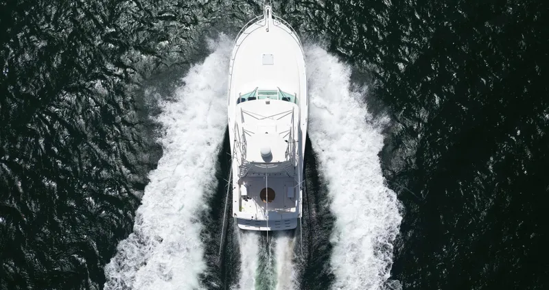 Slide: The Image of Aerial view of 2007 Cabo 40 Hardtop Express yacht cruising on open water. - 7