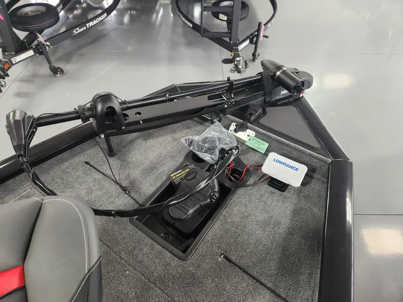 Slide: The Image of 2025 Tracker Pro Team 190 boat deck with trolling motor and Lowrance electronics. - 9