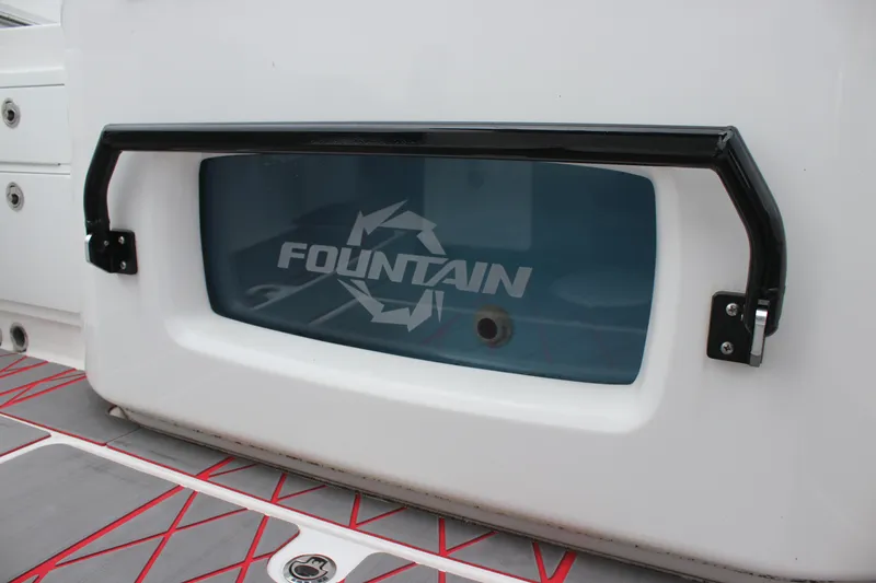 Slide: The Image of 2024 Fountain 32 NX boat detail with logo and sleek design elements. - 15