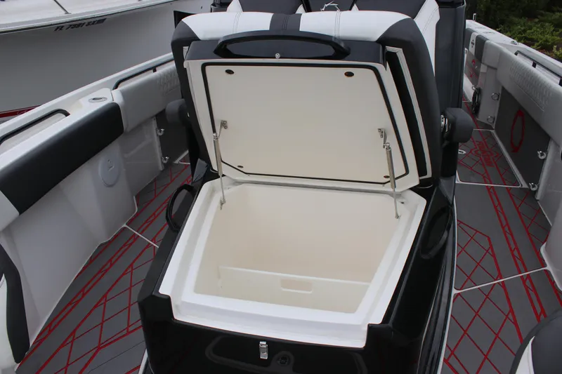 Slide: The Image of 2024 Fountain 32 NX boat interior with open storage compartment. - 18