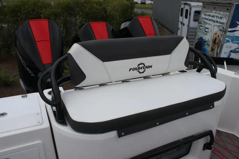 Slide: The Image of 2024 Fountain 32 NX boat seat with logo, featuring sleek design and powerful engines. - 7