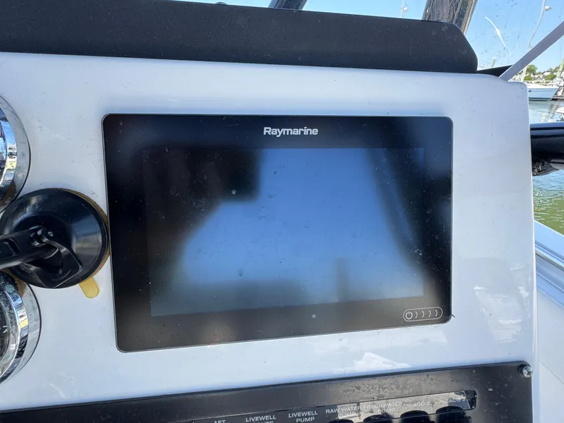 Slide: The Image of Raymarine display on 2020 Blackfin 212 CC boat dashboard, close-up view. - 18