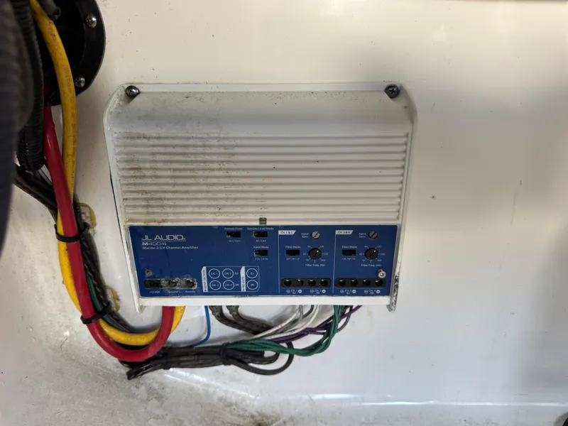 Slide: The Image of JL Audio amplifier with wiring in a 2020 Blackfin 212 CC boat. - 32