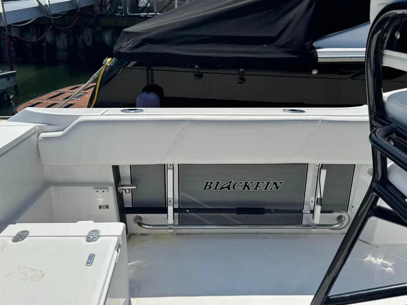 Slide: The Image of 2020 Blackfin 212 CC boat interior with branded seating and sleek design. - 9