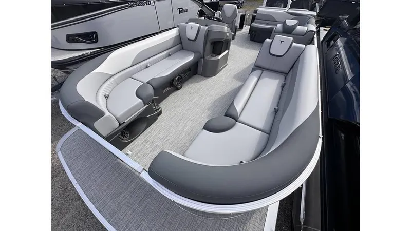 Slide: The Image of 2025 Tahoe Pontoon LTZ Cruise with spacious seating and modern design. - 13